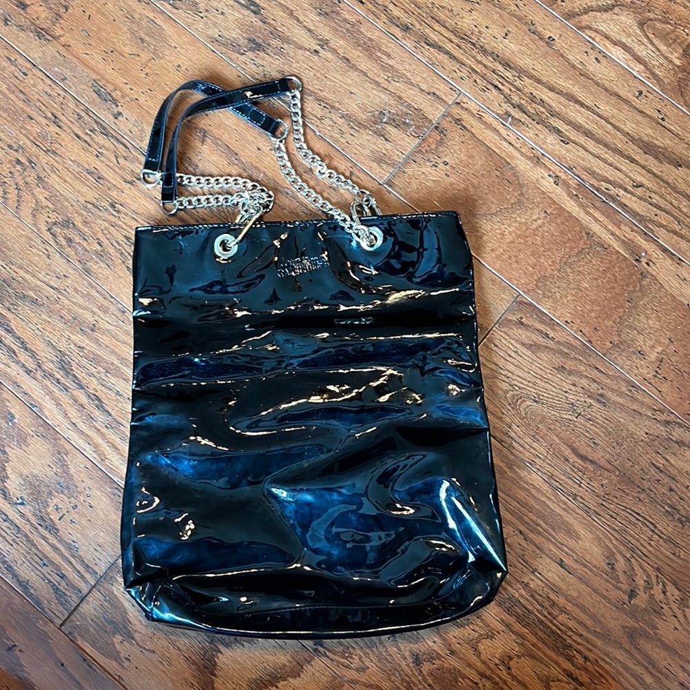 Discontinued, Jean Paul Gaultier leather and gold chain designer bag.